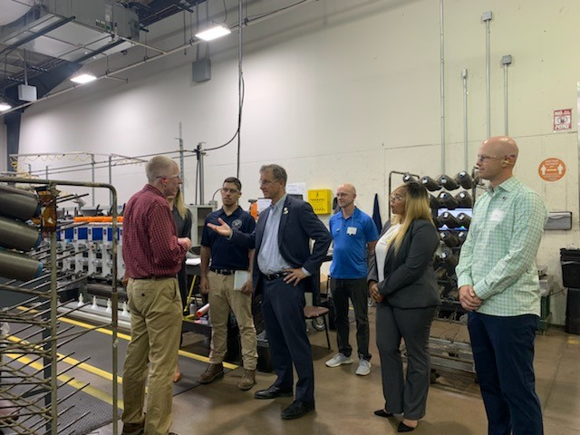 Congressman Cartwright with workers at Noble Biomaterials Inc.